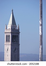 The Campanile (Sather Tower) On The UC Berkeley Campus, And A Flagpole.