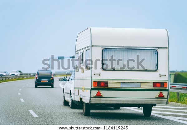 Camper in the road in\
Warsaw in Poland