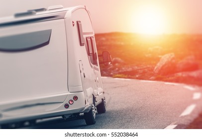 Camper RV Sunset Trip. Motorhome Summer Journey. Class C Recreational Vehicle on the Road - Shutterstock ID 552038464