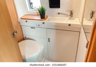 Camper Van Bathroom Interior With Toilet And Sink