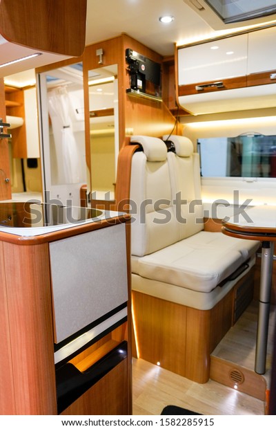 camper van motorhome modern wood interior in\
dealership showroom