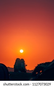 Camper Van Parked On A Camping Site In Cornwall At Sunset, England, UK