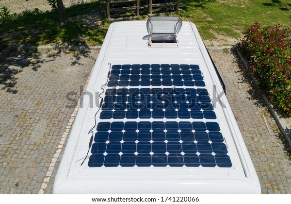 Camper van solar roof panels with skylight top\
view Motorhome