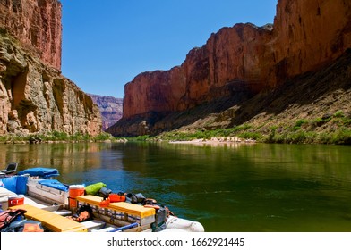Campers on a tranquil stretch of the Colorado River  in the Grand Canyon in Arizona. - Shutterstock ID 1662921445