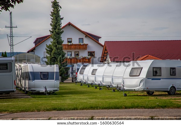 Campers Storage Parking with Many Recreational\
Vehicles in Row.