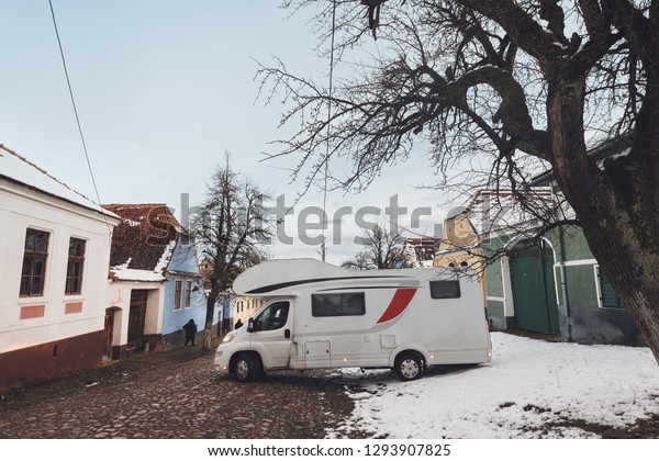Campervan caravan car journey through old\
villages saxons from europe\
heritage