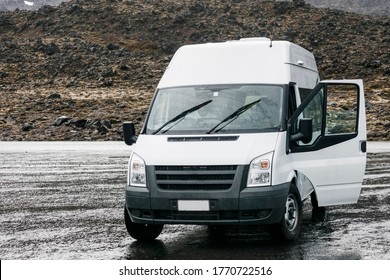 Campervan On Wet Road In Whakapapa, New Zealand.