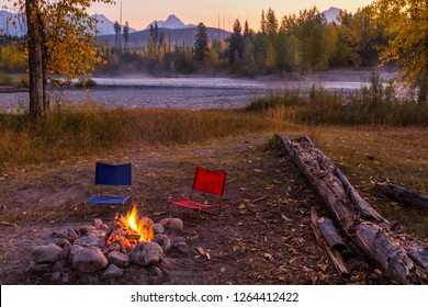 Campfire And Camp Chairs In Glacier National Park