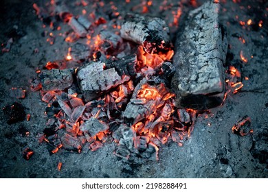 Campfire Coals And Ash In Fire Pit