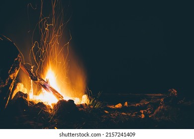 Campfire With Embers Glowing And Blowing Into The Night Sky In Summer On Mt. Hood Oregon