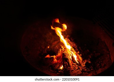 Campfire Flames And Embers From An Outdoor Camp Site At Night Unplugged And Relaxing By The Fire