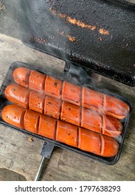 Campfire Hotdogs Steaming From Heat.