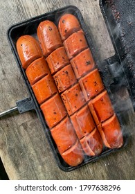 Campfire Hotdogs Steaming From Heat.