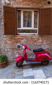 Campiglia Marittima/Italy - July 13 2018: A scooter outside a home in Italy