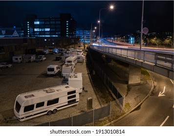 Camping in Altstetten under the Europabrucke bridge in Zurich, where Roma itinerant people camp with their motorhomes and caravans - Shutterstock ID 1913010814