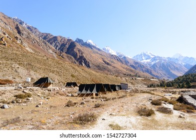 Camping Area Lightweight Backpacking Expedition Canvas Tents Installed Near Himalayas Mountain River Valley In Summer To Help Tourists To Stay Comfortable In Nature In Rain And Cold Weather At Night.