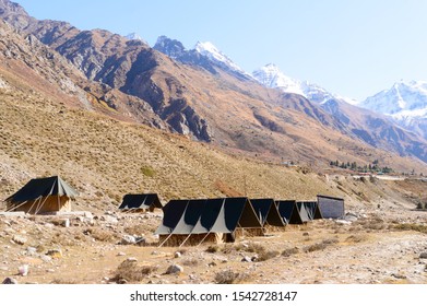 Camping Area Lightweight Backpacking Expedition Canvas Tents Installed Near Himalayas Mountain River Valley In Summer To Help Tourists To Stay Comfortable In Nature In Rain And Cold Weather At Night.