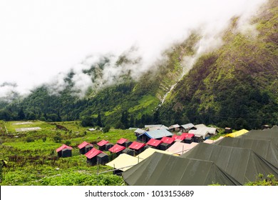 Camping In The Beautiful Valley Of Flowers In Nanda Devi Biosphere National Park In Uttarakhand, India. Beautiful & Serene Nature And Waterfalls, Greenery. Misty And Foggy Weather.
