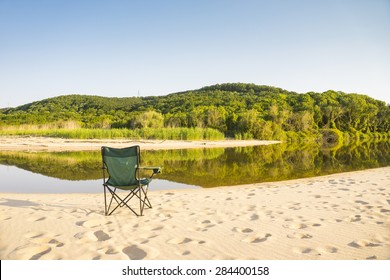 Camping Chair At Lake Side