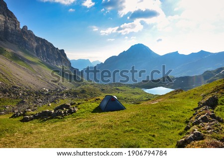 camping in a fantastic mountain landscape Imagine de stoc © 