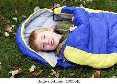 Camping Kid In Sleeping Bag