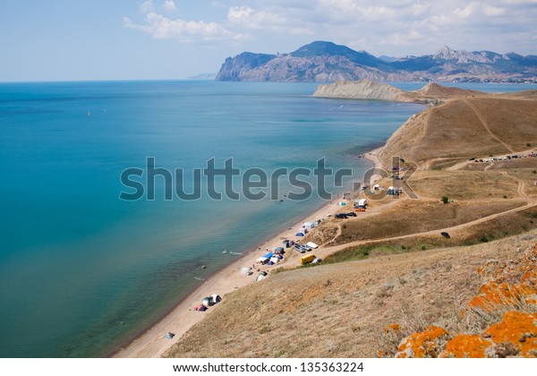 Camping on the beach in Silent Bay, Crimea\
peninsula, Ukraine