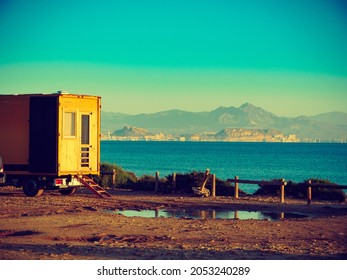 Camping On Sea Beach. Spanish Costa Blanca Coastline With Unusual Rv Camper Car, Spain Alicante Province, Santa Pola.