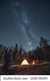 Camping In Pine Forest With Milky Way And Shooting Star At Assiniboine Provincial Park, Canada