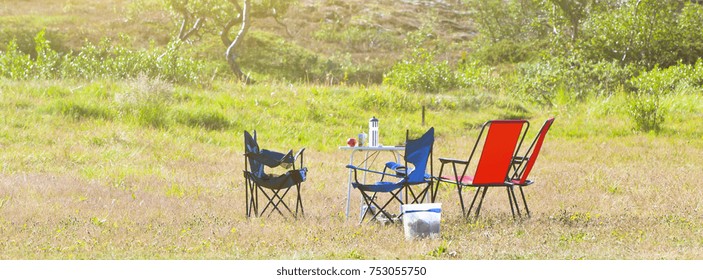 Camping Site With Camp-chairs And Table In Iceland. Long Wide Banner