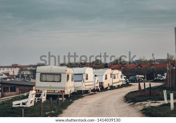 Camping site near the sea with camper vans,\
travelers expedition hipster holiday campervan journey nomad\
lifestyle holiday tourism caravan car motorhome outdoor trip, van\
life tourism travel\
vacation