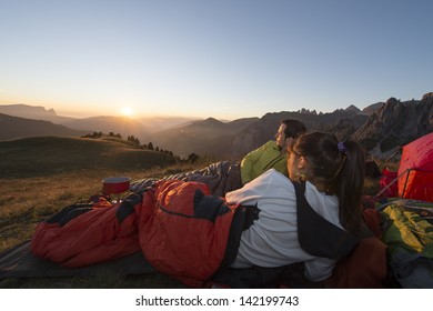 Camping With Sleeping Bag In The Dolomite - Sunset In Base Camp 