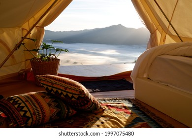 Camping tent with a beautiful view of sea mist