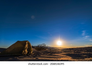 Camping Tent During Sunset With A Blue Sky In A Sandy Desert In Death Valley California 