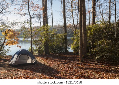 Camping Tent In The Woods By The Lakeside