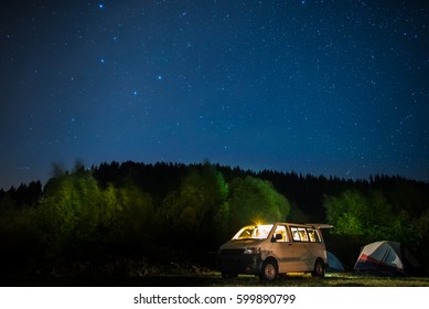 Camping With Tents And Car Under The Stars