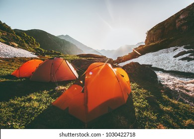 Camping Tents In Mountains Morning Sun Landscape Travel Lifestyle Concept Adventure Summer Vacations Outdoor Hiking Gear Equipment