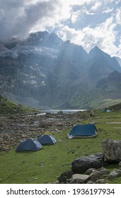 .Camping tents at the Nundkol lake which is near the Gangabal lake, at the base of Mount Harmukh. This is the last lake on the Kashmir Great Lake trek which is an alpine high altitude trek in Kashmir.