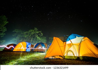 Camping Tourism And Tent With Star At Night Scene.