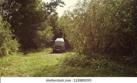 Camping van in forest 