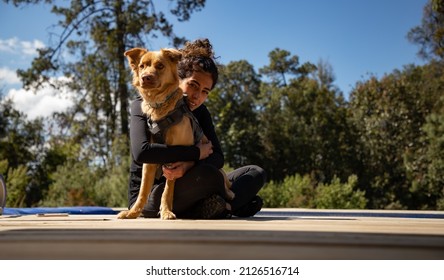 Camping Woman By The Lake With Dog