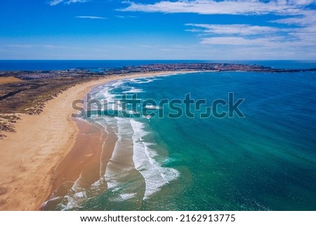 Campismo beach and Dunas beach and Island Baleal near Peniche on the shore of the Atlantic ocean in west coast of Portugal. Beautiful Baleal beach at Baleal peninsula close to Peniche, Portugal.