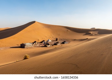 Campping Tent At Sahara Dune Sand 