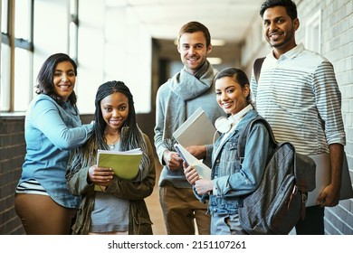 Campus clique. Cropped portrait of a group of university students standing in a campus corridor. - Shutterstock ID 2151107261