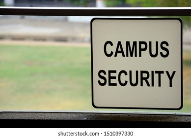 Campus Security Label Against A Green Field