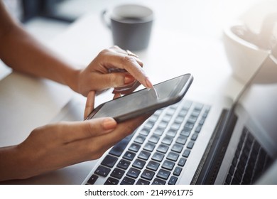 I Can Connect My Multiple Devices To Have The Same Information. Closeup Shot Of An Unrecognizable Female Designer Using A Cellphone In Her Home Office.