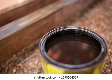 Can Of Dark Brown Wood Stain For Backyard DIY Project.