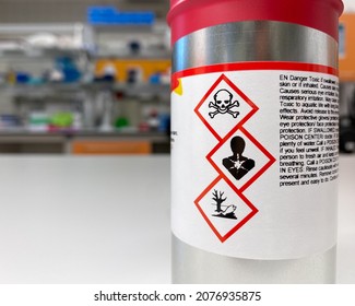 Can with extremely dangerous substance inside, labelled with symbols indicating that the content is toxic, poses health hazard and environmental hazard