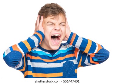 I Can Not Hear Anything - Portrait Of A Teen Boy 12-14 Year Old. Half-length Emotional Portrait Of Caucasian Teenager Screaming. Handsome Outraged Child Shouting Out Loud, Isolated On White Background