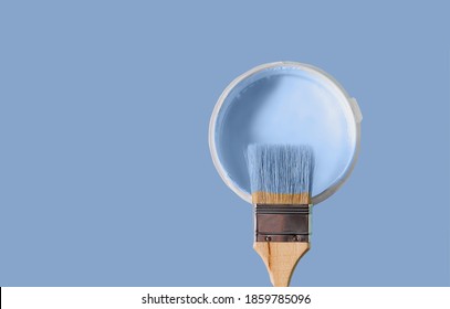 Can with paint of cerulean color on cerulean background. Copy space for your text. Trend color of 2021 year. - Shutterstock ID 1859785096