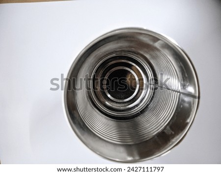 A can with a top view